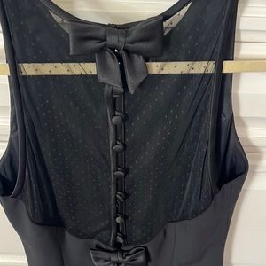 Vintage - Black Dress w/beautiful lace detail in the back. Size 6, fits like a 4